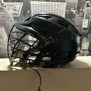 Black Cascade CPV-R Lacrosse Helmet with Gold Accents, youth size S/M